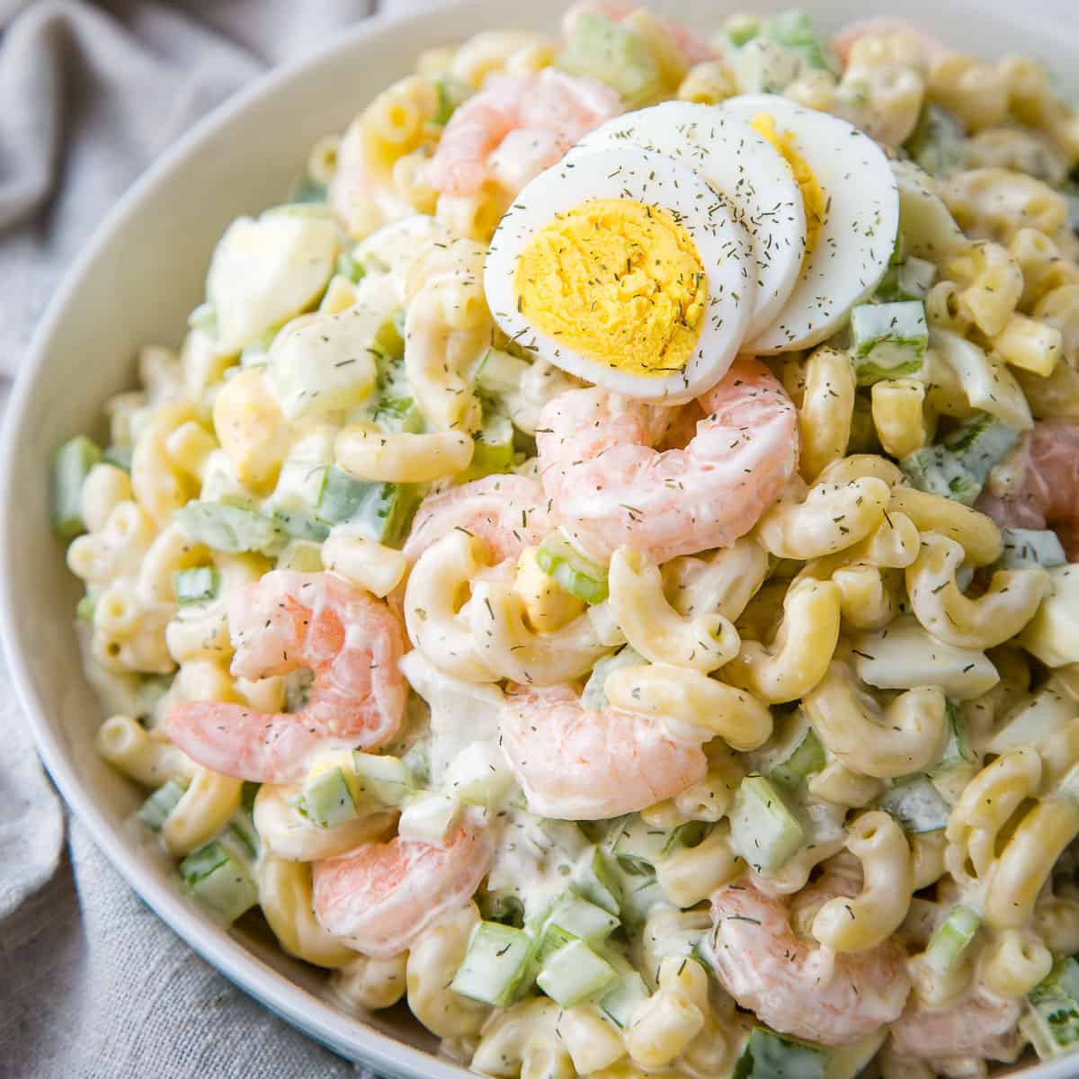 https://www.giftofhospitality.com/wp-content/uploads/2022/07/macaroni-salad-shrimp-square.jpg